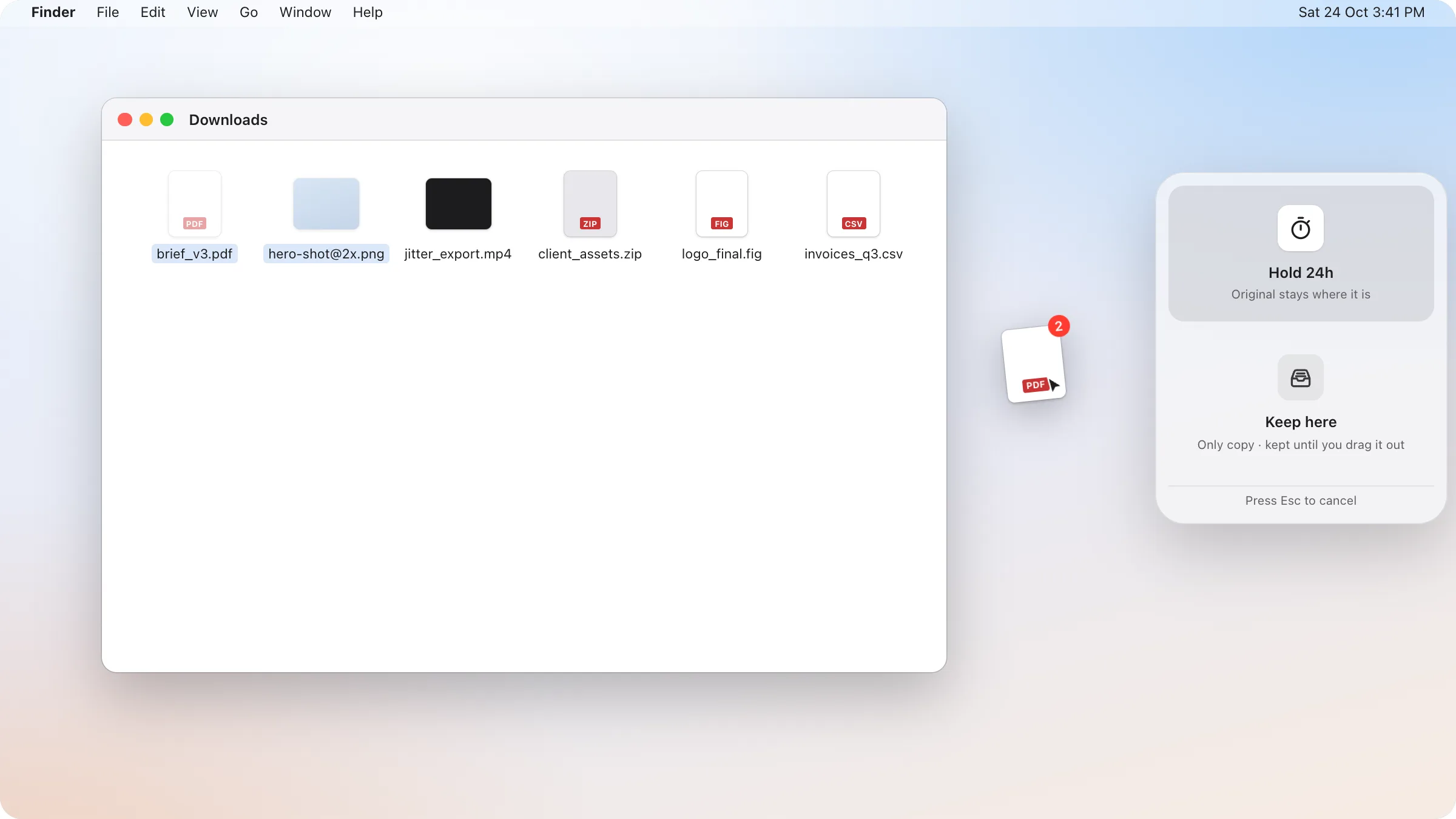 A file dragged to the right edge of the screen, where dragand's drop panel shows Hold 24h and Keep here.